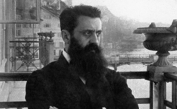 1901: Herzl on the balcony of “Les Trois Rois” Hotel in Basel, at Fifth Congress, overlooking the Rhine. Photo courtesy of the Central Zionist Archive/Courtesy Simon Wiesenthal Center